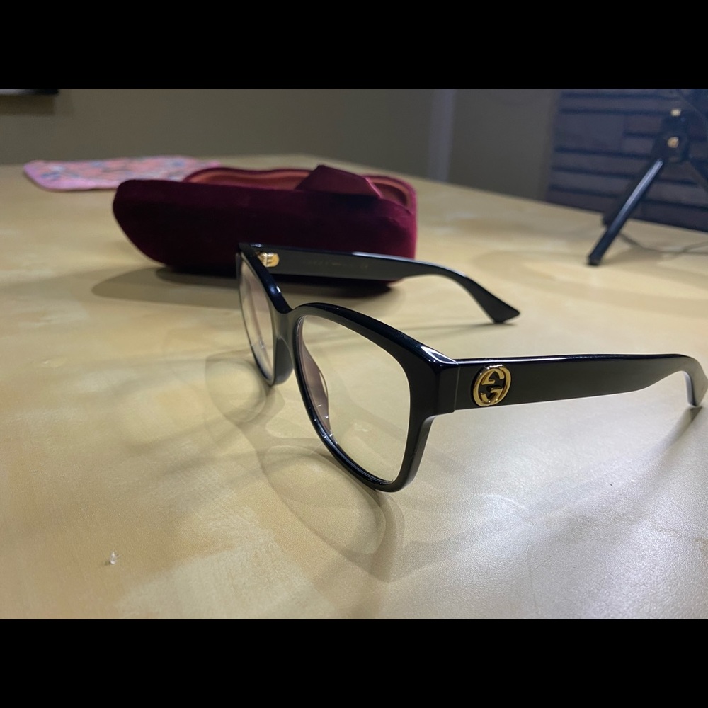 Pair of Gucci clear glasses
